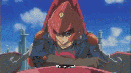 Red helmet guy draws a robot Yugioh card while riding his red motorcycle.